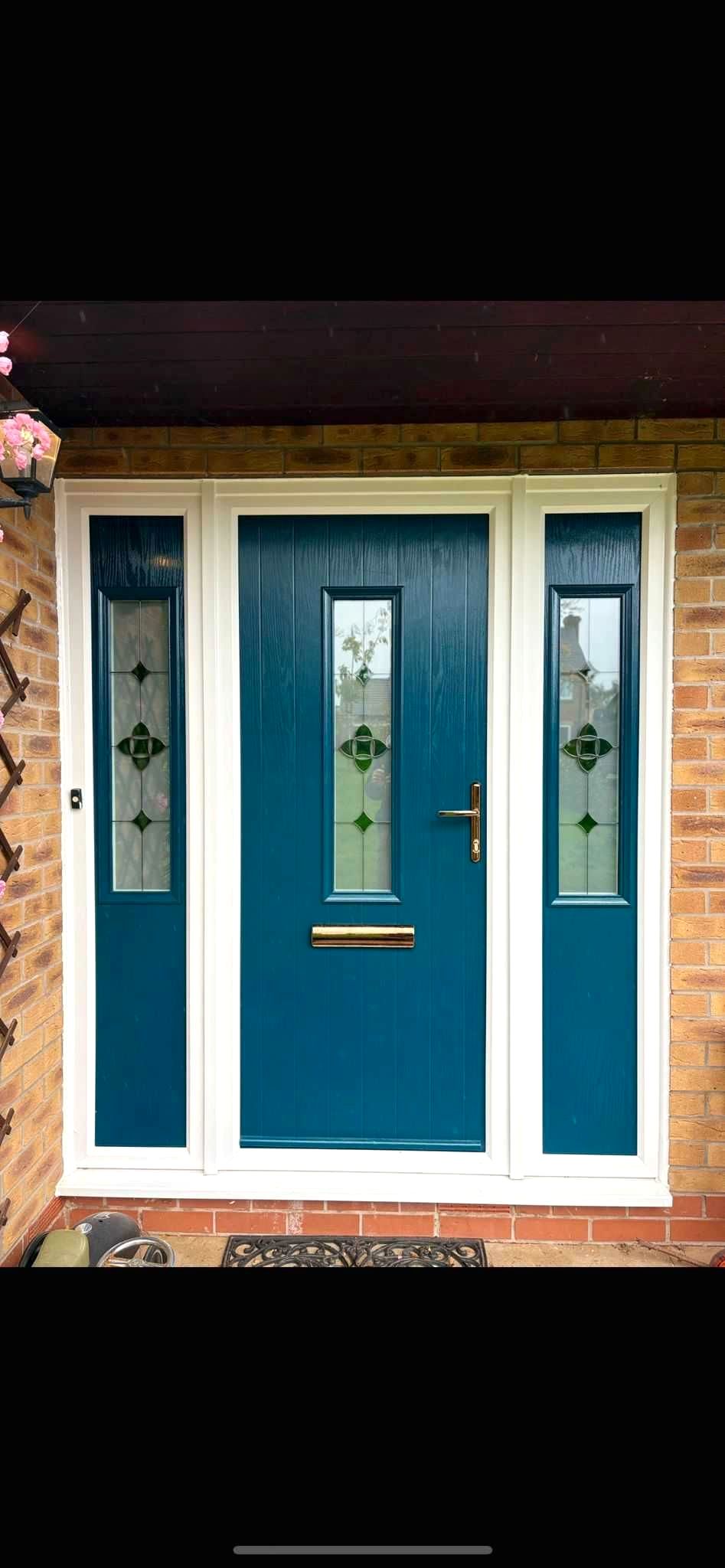 Premium teal composite door with decorative glass sidelights installed in Wantage by CJB Renovations
