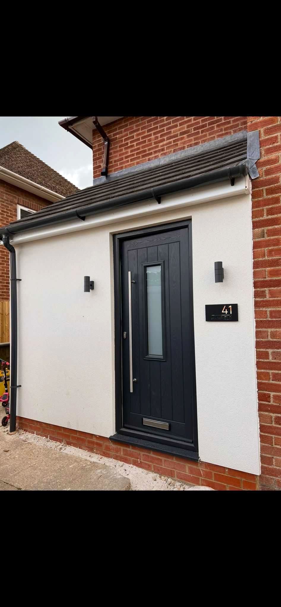 Modern porch extension with composite door by CJB Renovations